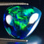 7.60 ct Pear Cabochon(16.35 x 14.37 mm)Ethiopian 360 Degree Flashing Black Opal