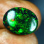 6.47 ct Fantastic Oval Cabochon (15.85 x 12.19 mm) Ethiopian Flashing Black Opal
