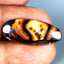 13.73 ct Oval Cabochon (28.44 x 12.06mm) Natural Australian Boulder Opal