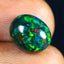2.96 ct Oval Cabochon (11.00 x 8.95 mm) Ethiopian Flashing Black Opal