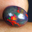 1.88 ct Oval Cabochon (9.84 x 7.86 mm) Ethiopian Flashing Black Opal