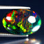 6.96 ct Oval Cabochon(17.82 x 12.06 mm)Ethiopian 360 Degree Flashing Black Opal