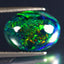 4.78 ct Fair Oval Cabochon(14.92 x 10.89 mm)Ethiopian Flashing Black Opal Stone