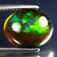 3.40 ct Oval Cabochon(12.40 x 10.11 mm)Ethiopian 360 Degree Flashing Black Opal