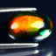 3.83 ct Oval Cabochon (13.76 x 9.05 mm) Ethiopian Flashing Black Opal