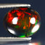 3.53 ct Eye-popping Oval Cabochon (12.00 x 9.81 mm) Flashing Black Opal Gemstone