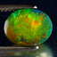 1.74 ct Elegant Oval Cabochon (10.14 x 7.97 mm) Ethiopian Flashing Black Opal