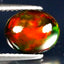 2.07 ct Incredible Oval Cabochon (10.19 x 8.24 mm) Ethiopian Flashing Black Opal