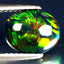 1.53 ct Superior Oval Cabochon (10.15 x 8.04 mm) Ethiopian Flashing Black Opal