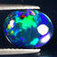 1.40 ct Fabulous Oval Cabochon (10.12 x 8.15 mm) Ethiopian Flashing Black Opal