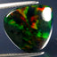 7.20 ct Impressive Pear Cabochon(14.23 x 13.28 mm)Ethiopian Flashing Black Opal
