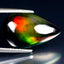 5.16 ct Five-star Pear Cabochon (17.18 x 10.71 mm) Ethiopian Flashing Black Opal