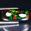9.18 ct Dazzling Cushion Cabochon(21.22 x 9.44 mm)Ethiopian Flashing Black Opal