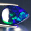 4.27 ct Phenomenal Pear Cabochon(14.04 x 10.13 mm)Ethiopian Flashing Black Opal