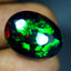 16.11 ct Charming Oval Cabochon (19.72 x 15.46 mm) Ethiopian Flashing Black Opal