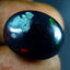 16.11 ct Charming Oval Cabochon (19.72 x 15.46 mm) Ethiopian Flashing Black Opal