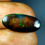 5.24 ct Awe-inspiring Oval Cabochon(19.52 x 9.11 mm)Flashing Black Opal Gemstone