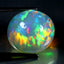 20.23 ct Oval Cabochon (19.50 x 17.94 mm) Natural Play of Colors Rainbow Opal