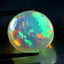 20.23 ct Oval Cabochon (19.50 x 17.94 mm) Natural Play of Colors Rainbow Opal