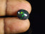 2.12 ct Oval Cabochon (11.97 x 9.69 mm) Flashing Black Opal Gemstone