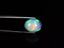 4.07 ct Terrific Oval Cabochon (12.98 x 10.51 mm) Ethiopian Rainbow Opal