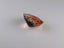 6.95 ct AIG Certified Oval (13.34 x 10.44 mm) Un-Heated Orange Tourmaline