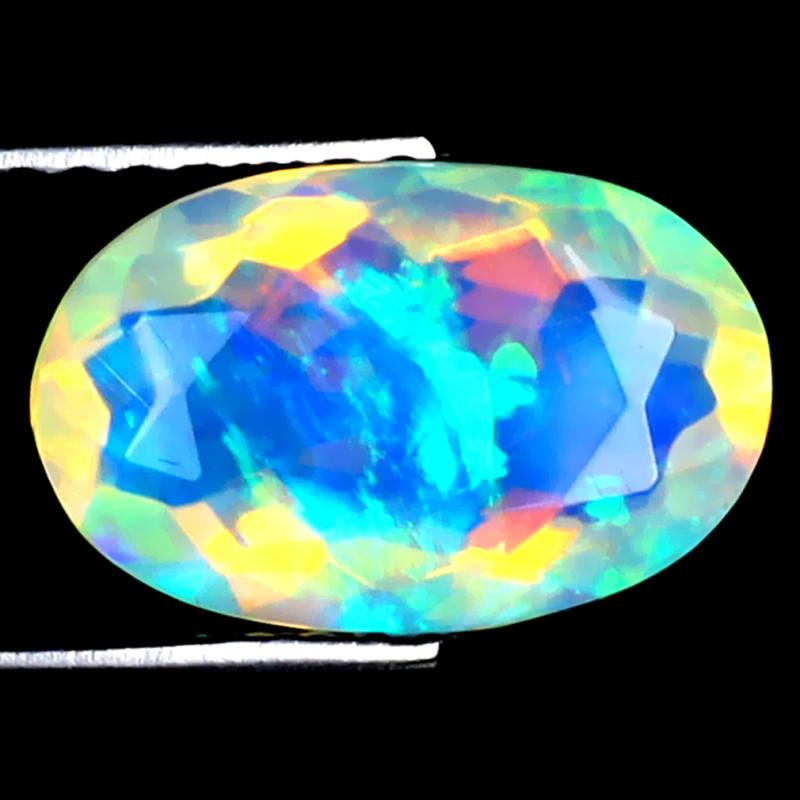 1.55 ct Flashing Oval (11 x 7 mm) Ethiopian 360 Degree Flashing Rainbow Opal Natural Gemstone