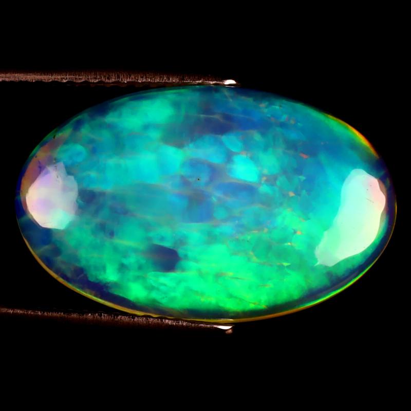 5.47 ct Mind-Boggling Oval Cabochon (21 x 13 mm) Ethiopian 360 Degree Flashing Rainbow Opal Natural Gemstone