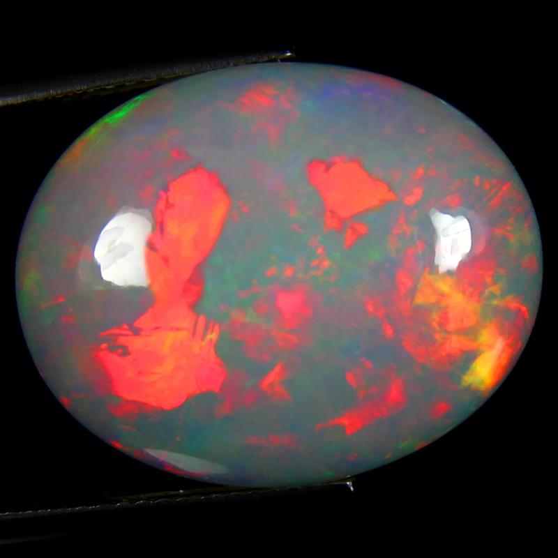 19.56 ct Lovely Oval Cabochon (23 x 18 mm) Flashing 360 Degree Multicolor Rainbow Opal Gemstone