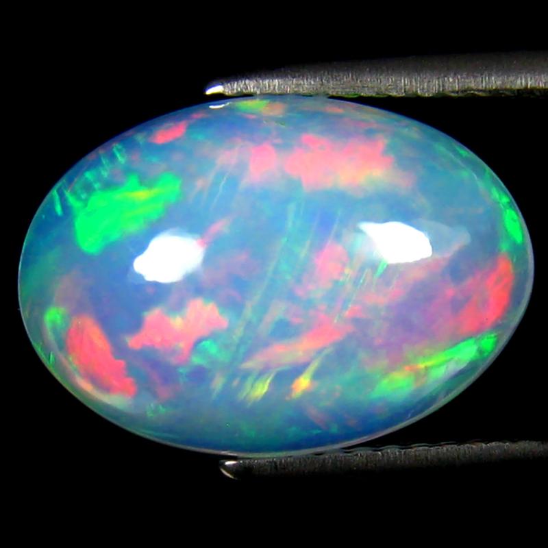 5.48 ct Eye-opening Oval Cabochon (15 x 11 mm) Ethiopian 360 Degree Flashing Rainbow Opal Natural Gemstone