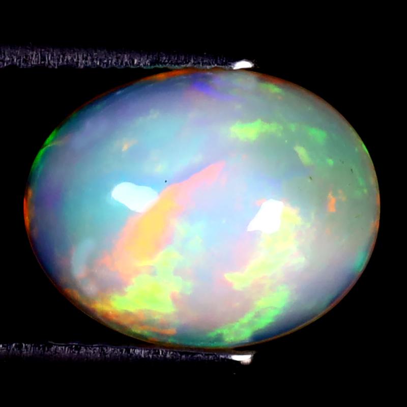 2.92 ct Pretty Oval Cabochon (11 x 9 mm) Ethiopian 360 Degree Flashing Rainbow Opal Natural Gemstone