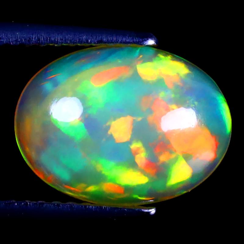 2.83 ct Tremendous Oval Cabochon (12 x 9 mm) Ethiopian 360 Degree Flashing Rainbow Opal Natural Gemstone