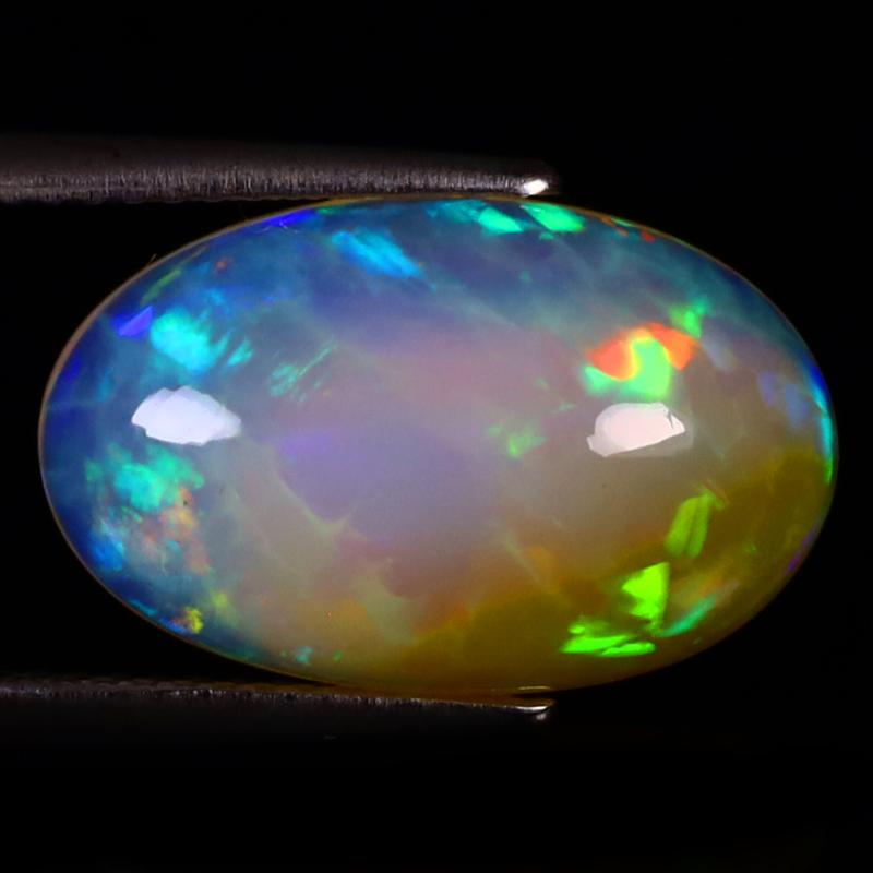 5.60 ct Extraordinary Oval Cabochon (17 x 11 mm) Ethiopian 360 Degree Flashing Rainbow Opal Natural Gemstone