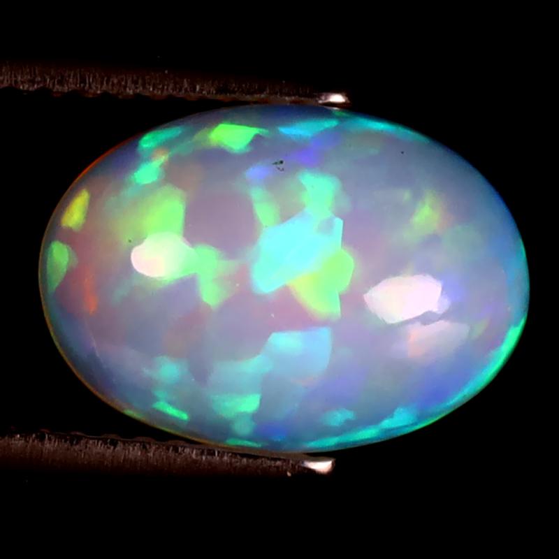 2.79 ct Magnificent Oval Cabochon (12 x 9 mm) Ethiopian 360 Degree Flashing Rainbow Opal Natural Gemstone