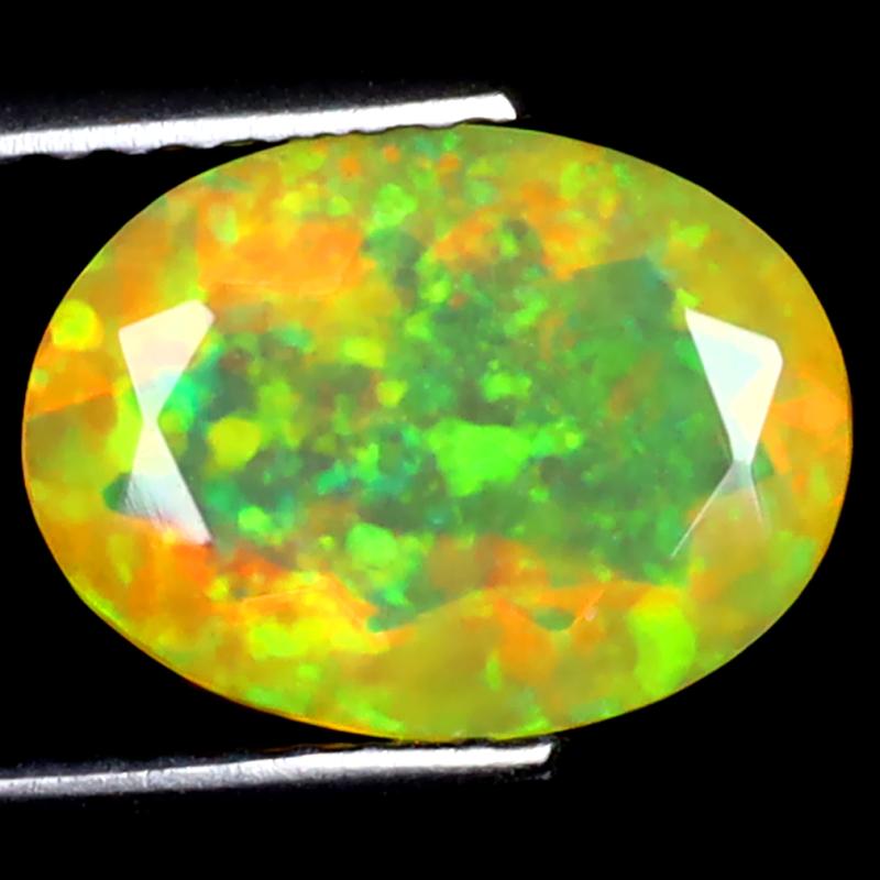 1.35 ct Terrific Oval (10 x 8 mm) Ethiopian 360 Degree Flashing Rainbow Opal Natural Gemstone
