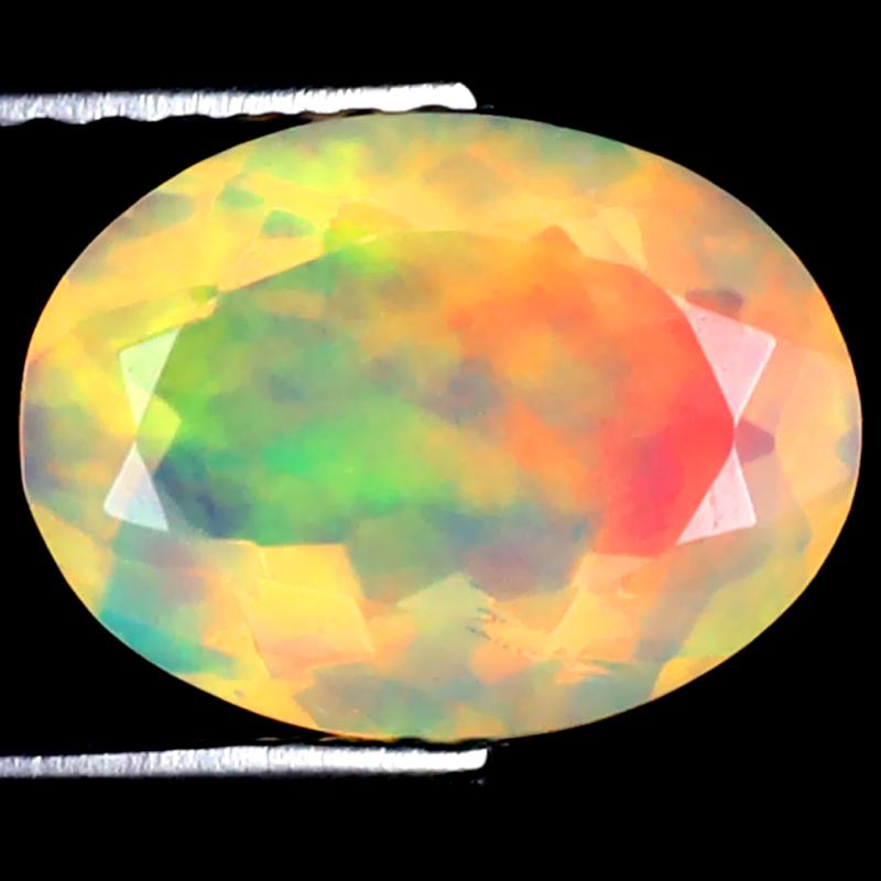 1.65 ct Incredible Oval (10 x 8 mm) Ethiopian 360 Degree Flashing Rainbow Opal Natural Gemstone