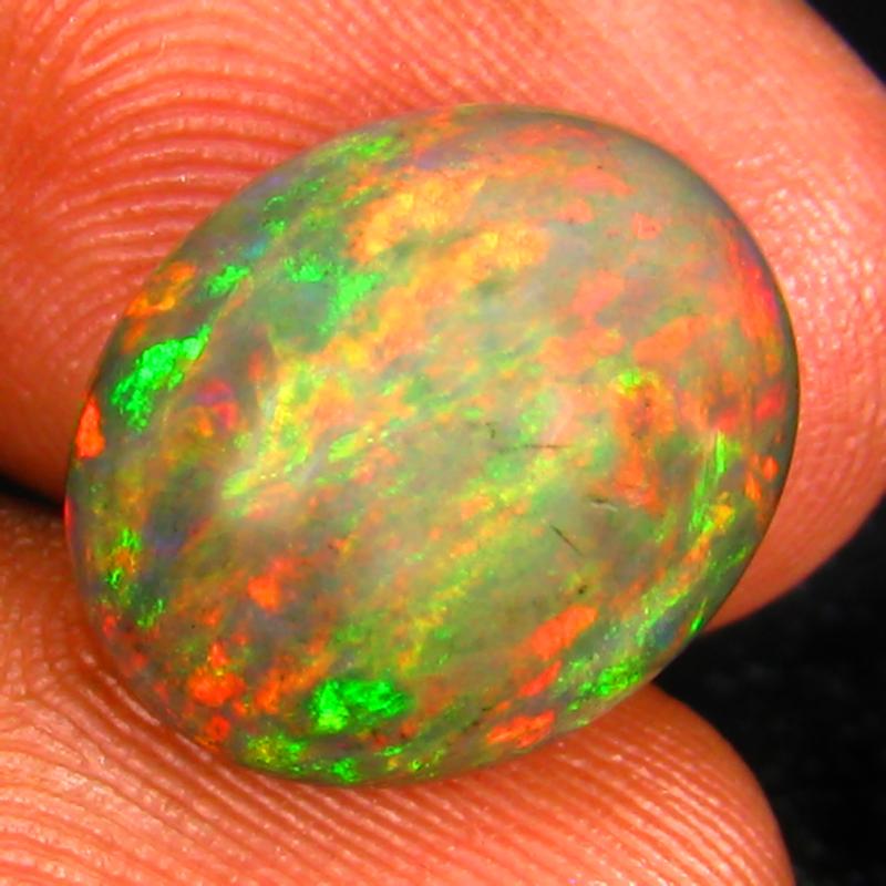 4.59 ct Five-star Oval Cabochon (14 x 12 mm) Ethiopian 360 Degree Flashing Black Opal Natural Gemstone