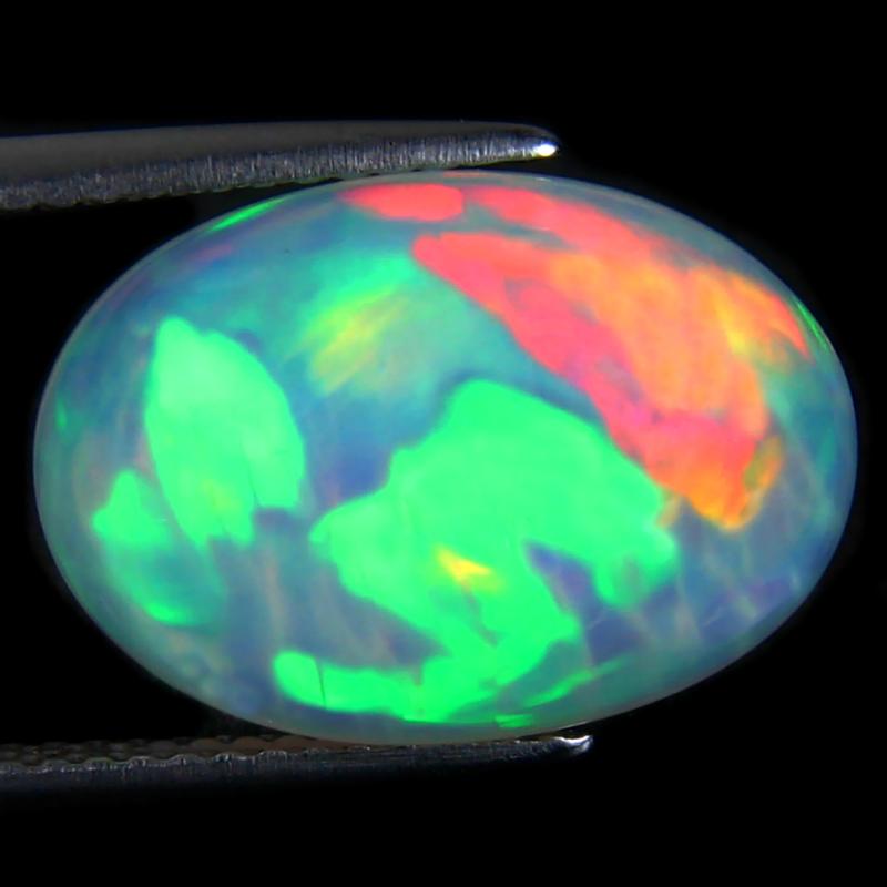 5.75 ct First-class Oval Cabochon (16 x 11 mm) Ethiopian 360 Degree Flashing Rainbow Opal Natural Gemstone