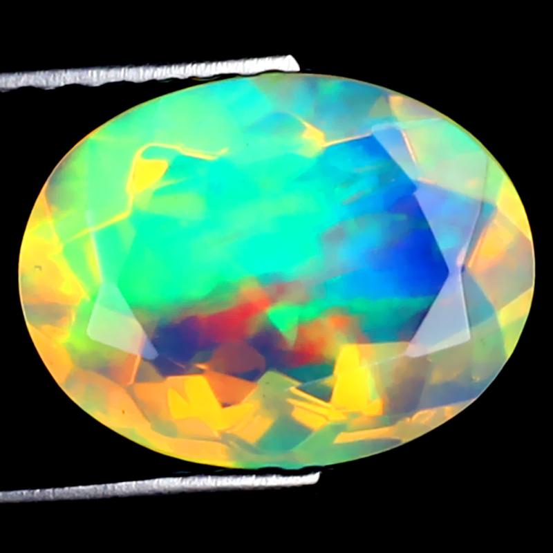 1.61 ct Mind-Boggling Oval (10 x 8 mm) Ethiopian 360 Degree Flashing Rainbow Opal Natural Gemstone
