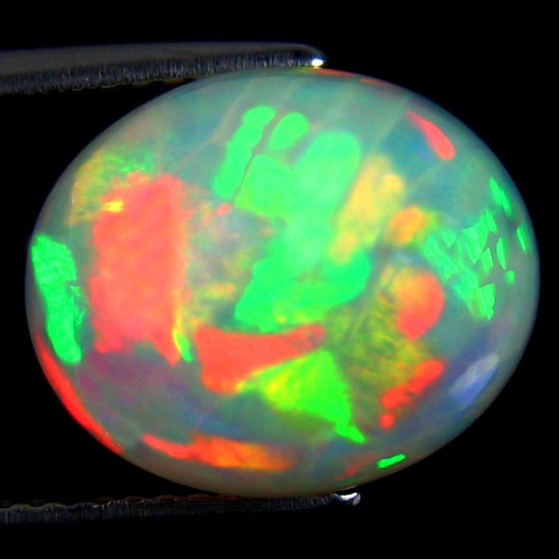 5.60 ct Eye-catching Oval Cabochon (13 x 11 mm) Ethiopian 360 Degree Flashing Rainbow Opal Natural Gemstone