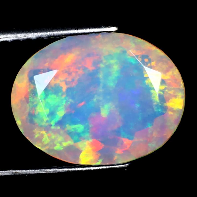 2.87 ct Phenomenal Oval (13 x 10 mm) Un-Heated Ethiopia Rainbow Opal Loose Gemstone