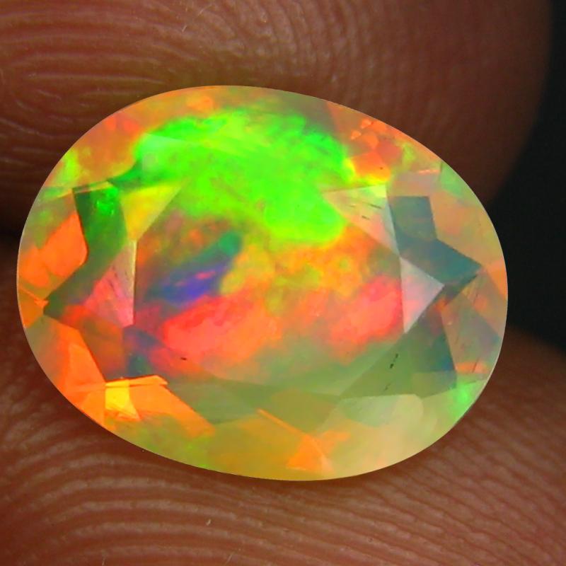 1.60 ct Excellent Oval (11 x 8 mm) Un-Heated Ethiopia Rainbow Opal Loose Gemstone