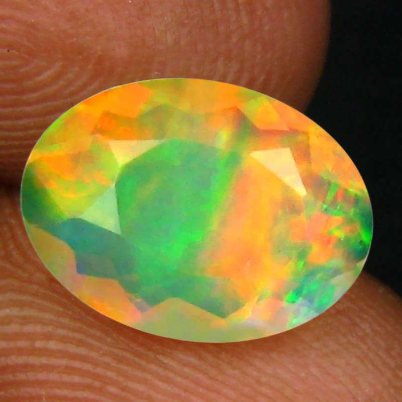 1.57 ct Terrific Oval (11 x 8 mm) Un-Heated Ethiopia Rainbow Opal Loose Gemstone