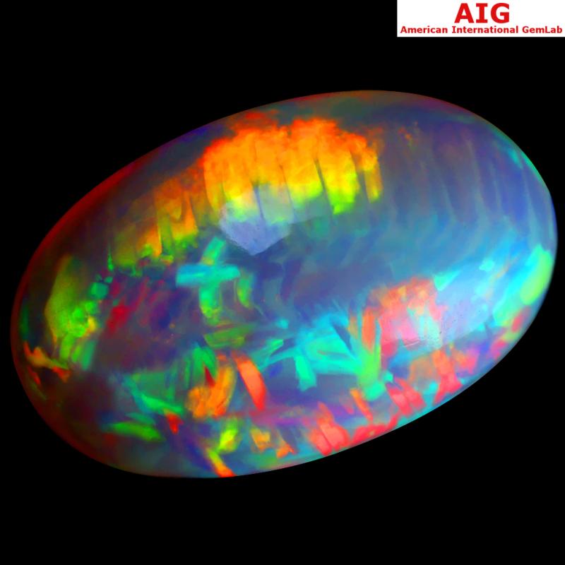 19.24 ct AIG CERTIFIED MAGNIFICENT FIRE OVAL CABOCHON CUT (25 X 16 MM) FLASHING 360 DEGREE MULTICOLOR RAINBOW OPAL