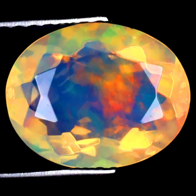 2.31 ct Eye-opening Oval (11 x 9 mm) Ethiopian 360 Degree Flashing Rainbow Opal Natural Gemstone