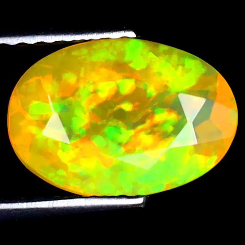 1.72 ct Significant Oval (11 x 7 mm) Ethiopian 360 Degree Flashing Rainbow Opal Natural Gemstone