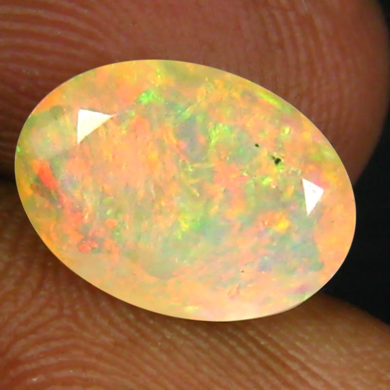 1.62 ct Eye-popping Oval (11 x 8 mm) Un-Heated Ethiopia Rainbow Opal Loose Gemstone