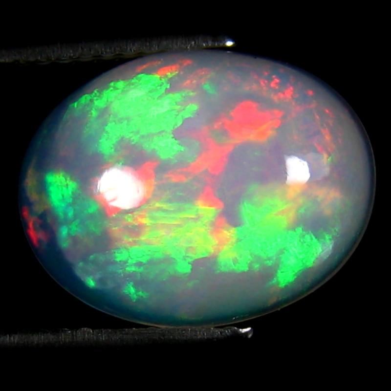 4.38 ct Grand looking Oval Cabochon (14 x 11 mm) Ethiopian 360 Degree Flashing Rainbow Opal Natural Gemstone