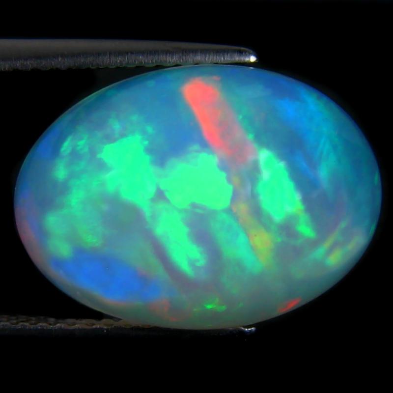 6.05 ct Magnificent Oval Cabochon (17 x 12 mm) Ethiopian 360 Degree Flashing Rainbow Opal Natural Gemstone
