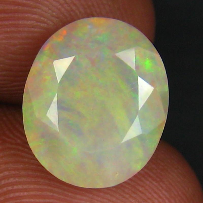 3.28 ct Mesmerizing Oval (12 x 10 mm) Un-Heated Ethiopia Rainbow Opal Loose Gemstone